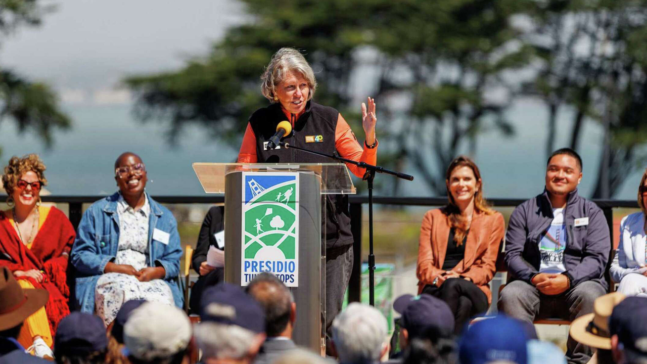 Christine Lehnertz, president and CEO of the Golden Gate National Parks Conservancy, speaks at the ribbon cutting ceremony for the Presidio Tunnel Tops.