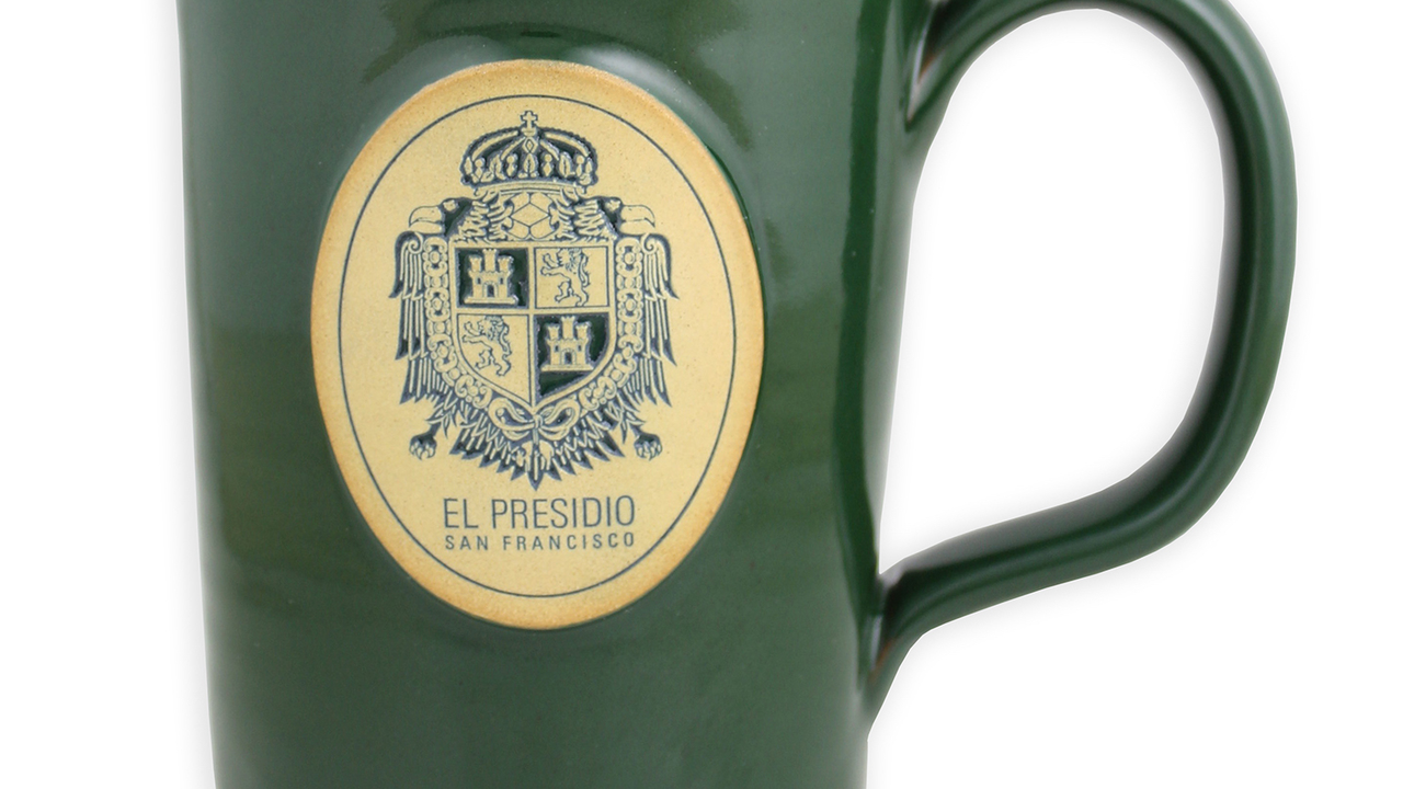 Dark green mug with the Presidio US Army coat of arms