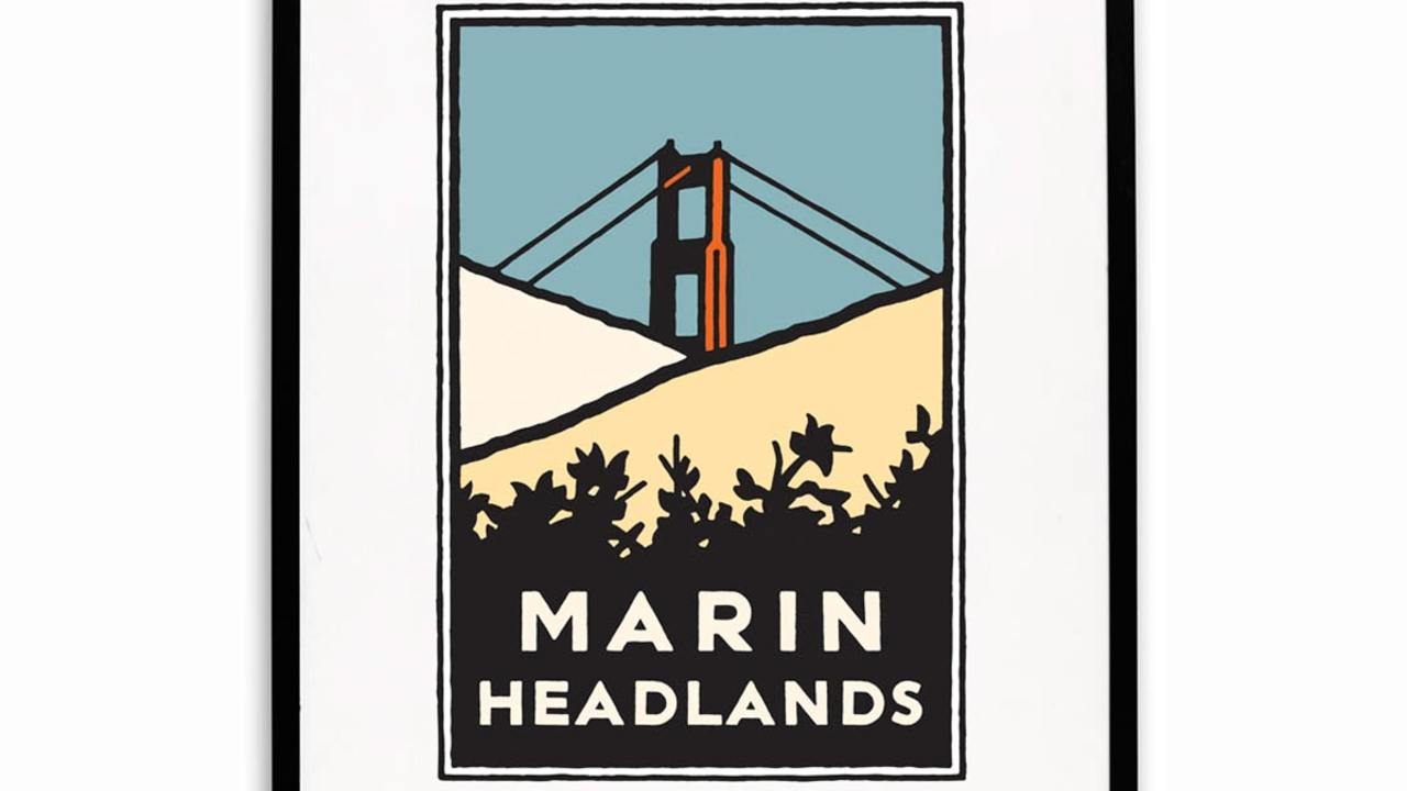 Golden Gate Bridge behind the grassy hills of the Marin Headlands