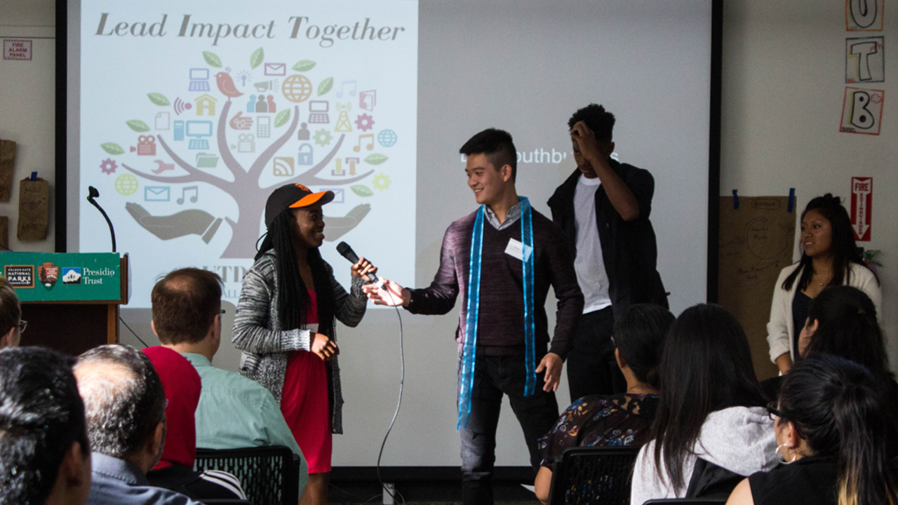 YAC members speaking at their event
