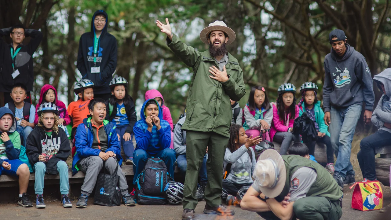 A national park ranger engages the youth