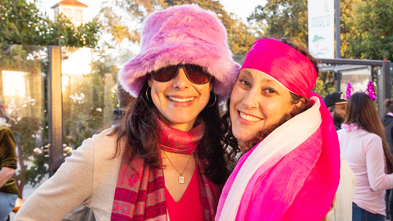 Attendees pose for a photo at Pink Full Moon Party 2025 at the Presidio Tunnel Tops.