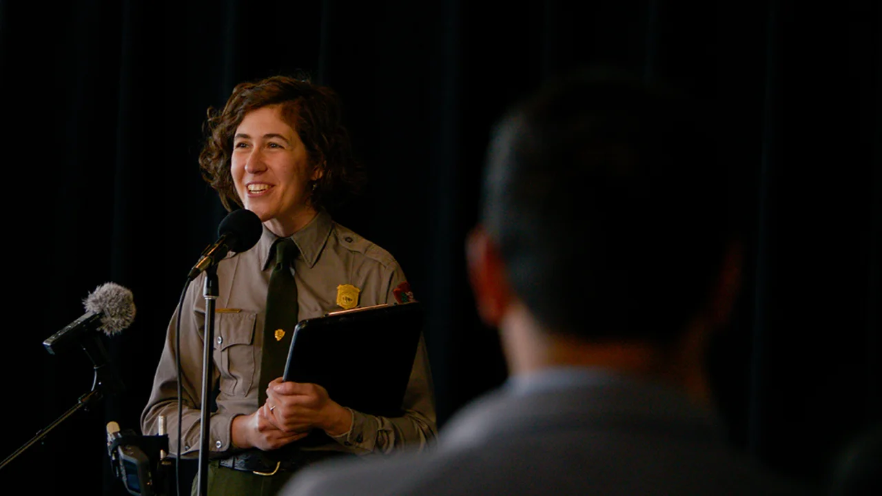 Woman at microphone