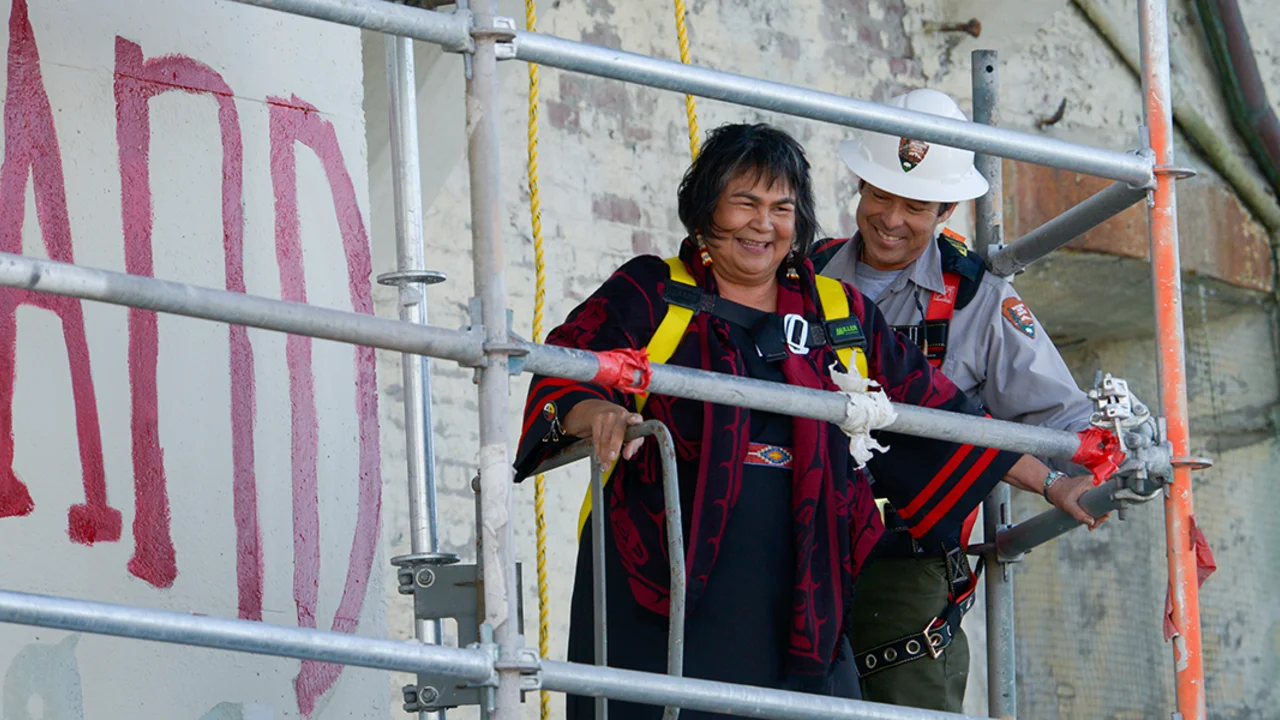 woman's smile shines so bright on alcatraz