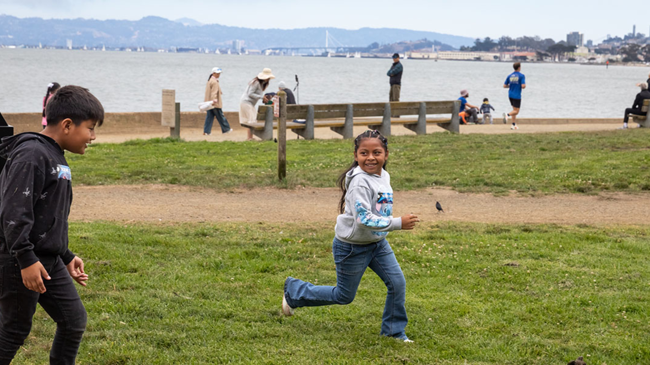 Participants from ALAS (Ayundando Latinos A Soñar) enjoying the "Raíces en la Bahía/Rooted in the Bay" event for farmworkers and their families in September 2024. Activities included crabbing, hiking, and beachside recreation.