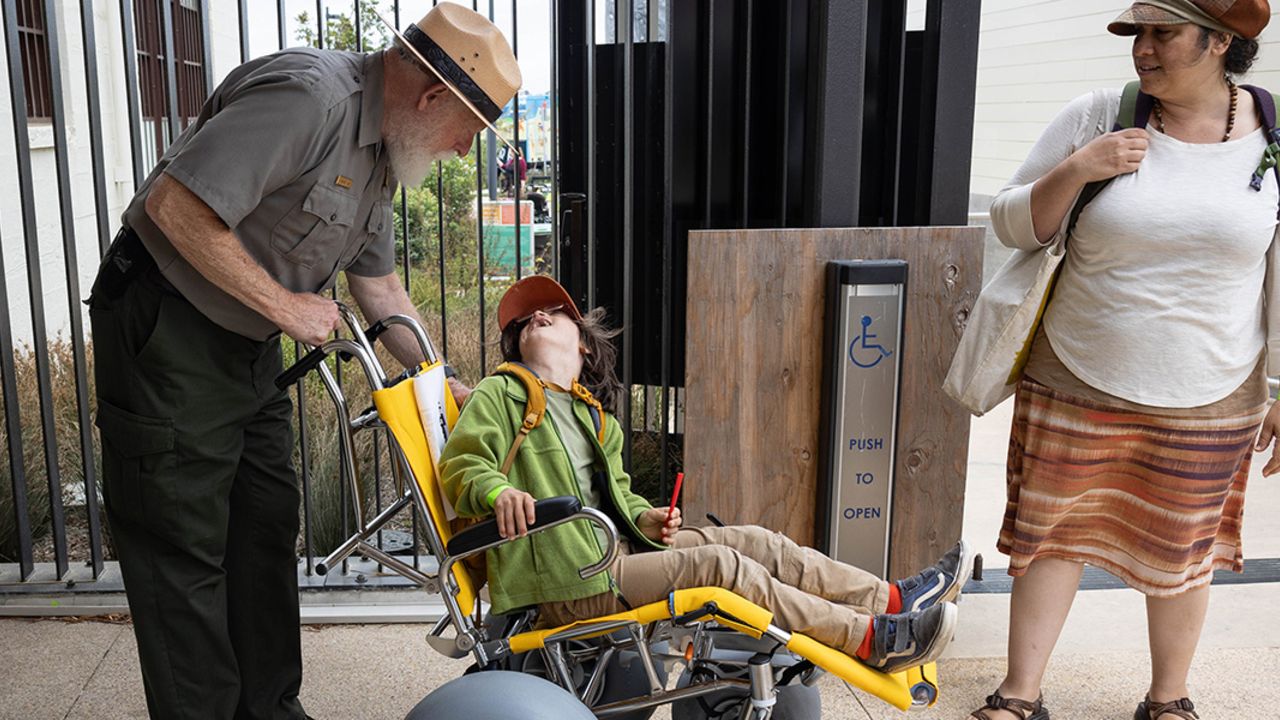 NPS Ranger greets an Access to Adventure Day attendee at the Presidio Tunnel Tops.