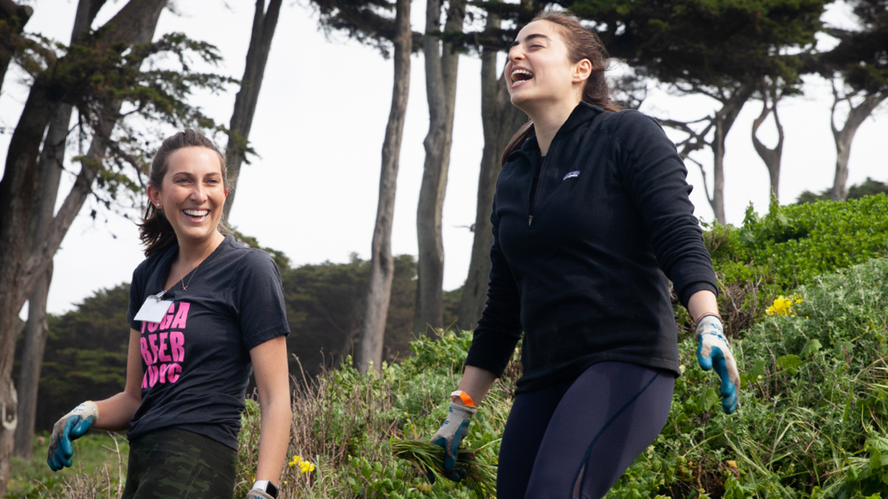 LAEN_RCW_20190406_487_2x1.jpg Volunteer laugh on hillside of Lands End.
