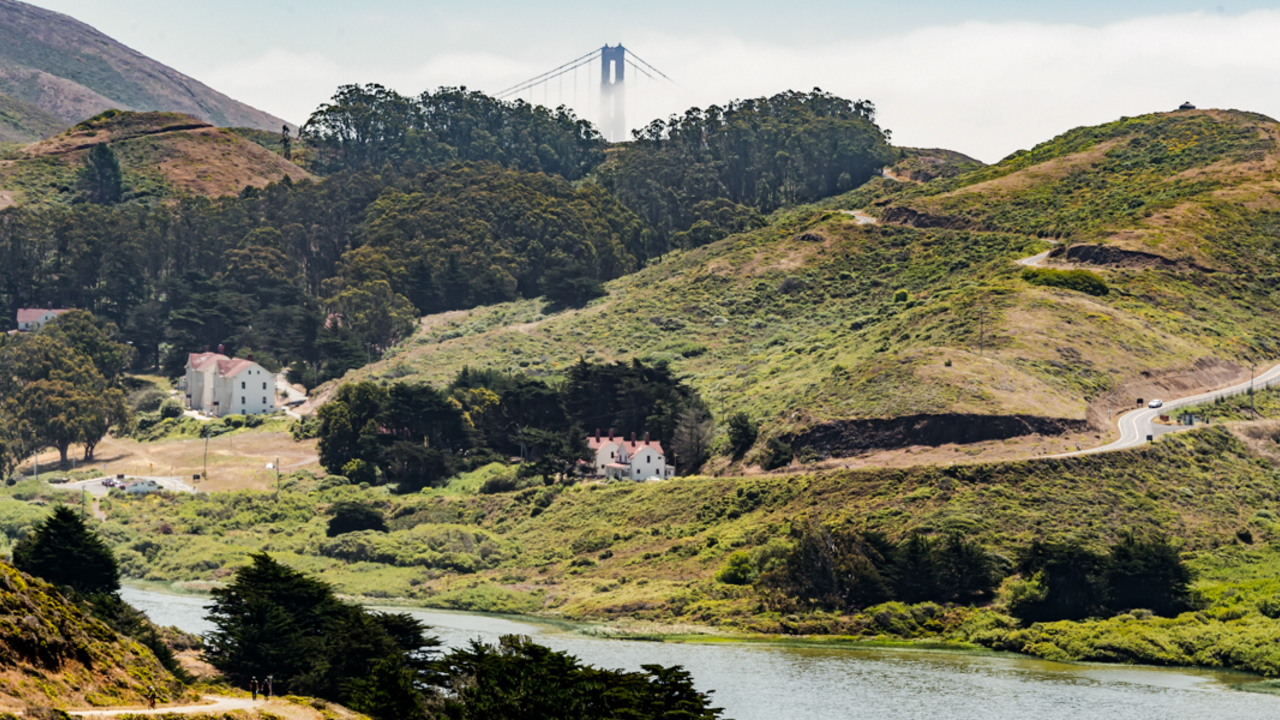 Golden Gate Bridge peeks over the Marin Headlands The Golden Gate Bridge peers over the mountains and into the valleys of the Marin Headlands.