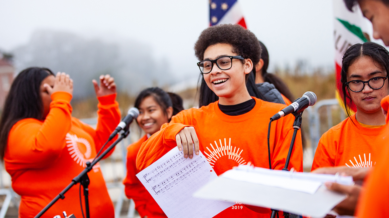 High School students sing in youth choir at Presidio Tunnel Tops ground-making ceremony.