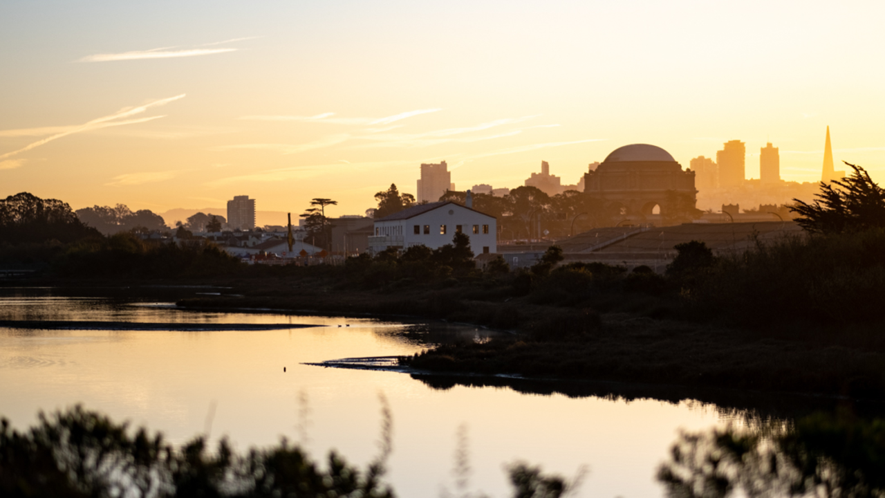 Sunrise at Crissy Marsh The sun rising over Crissy Marsh, beaming about the San Francisco skyline.