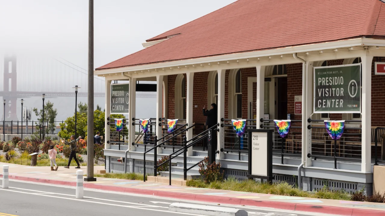 Presidio Visitor Center with rainbow-colored bunting flags for LGBTQ pride. 