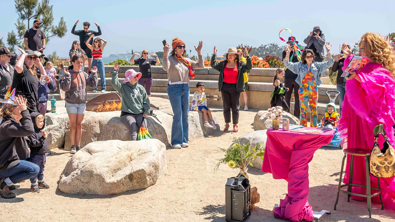 PRSF_20240601_DAr_035_2x1.jpg Crowd gathered around the Campfire Circle at the Presidio Tunnel Tops for Drag Story Hour.