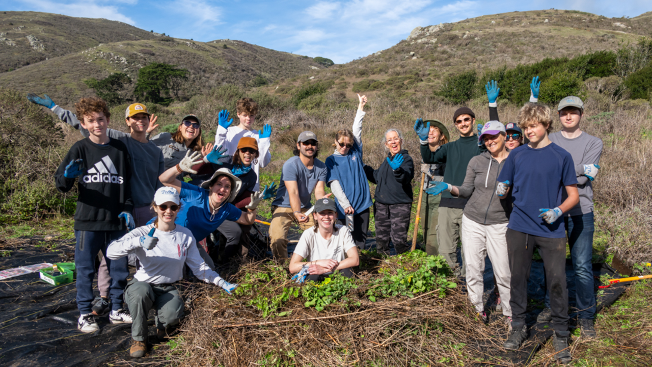 A group of park stewardship volunteers post for a photo at Tennessee Valley