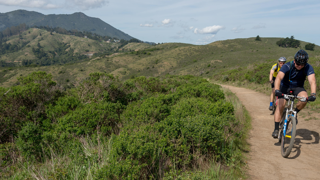 Cyclists power forward along the Miwok Trail Cyclists power forward along the Miwok Trail