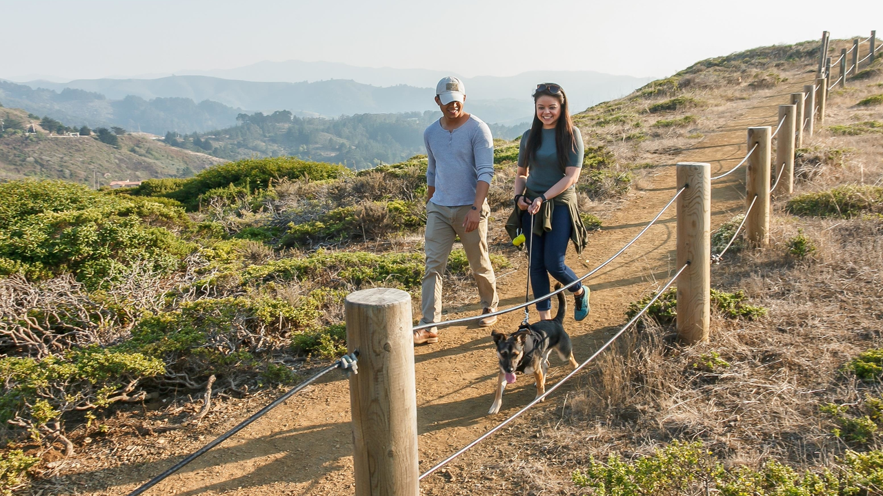 Visitors stroll Milagra Ridge