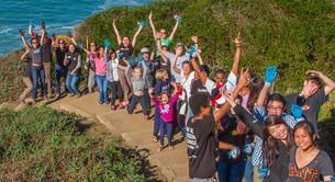 Volunteers line up at Baker Beach