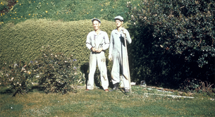 Two Alcatraz inmates standing in the garden