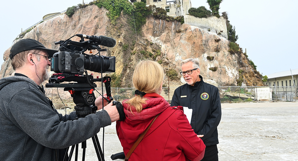 John Cantwell talks to reporters on Alcatraz Island.