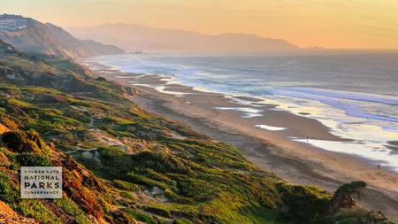 The shoreline of Fort Funston stretches out during sunset