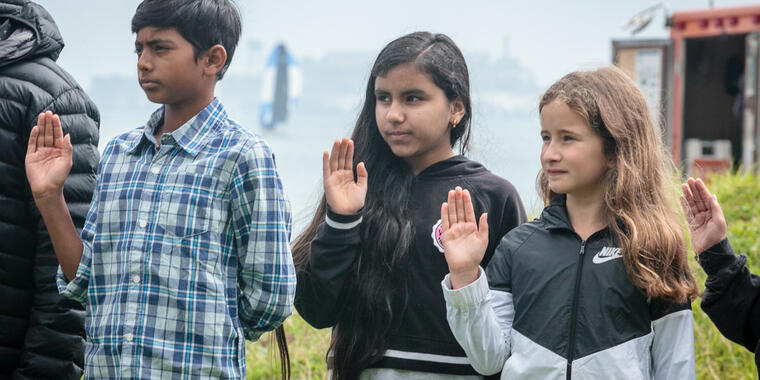 Young people participate in a special naturalization ceremony at Crissy Field. Crissy Field Naturalization Ceremony
