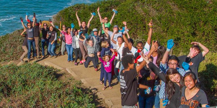 Volunteers line up at Baker Beach