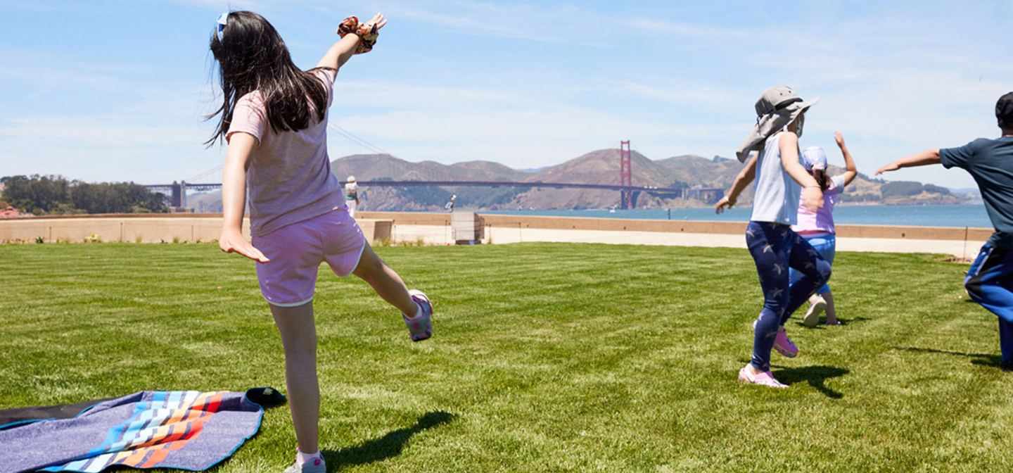 Children playing on lawn at Presidio Tunnel Tops