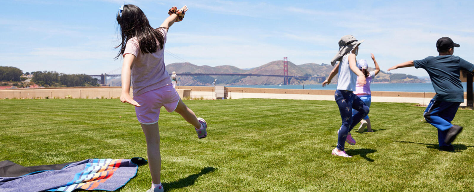 Children playing on lawn at Presidio Tunnel Tops