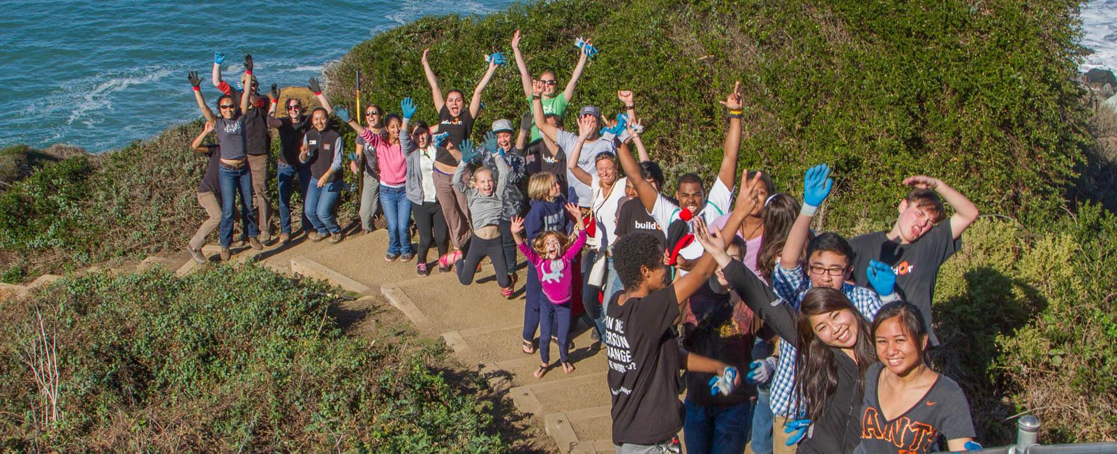 Volunteers celebrating a successful day of service