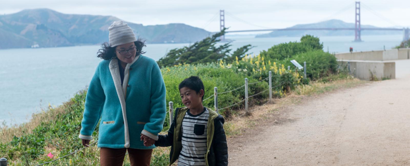 A family takes a walk at Lands End