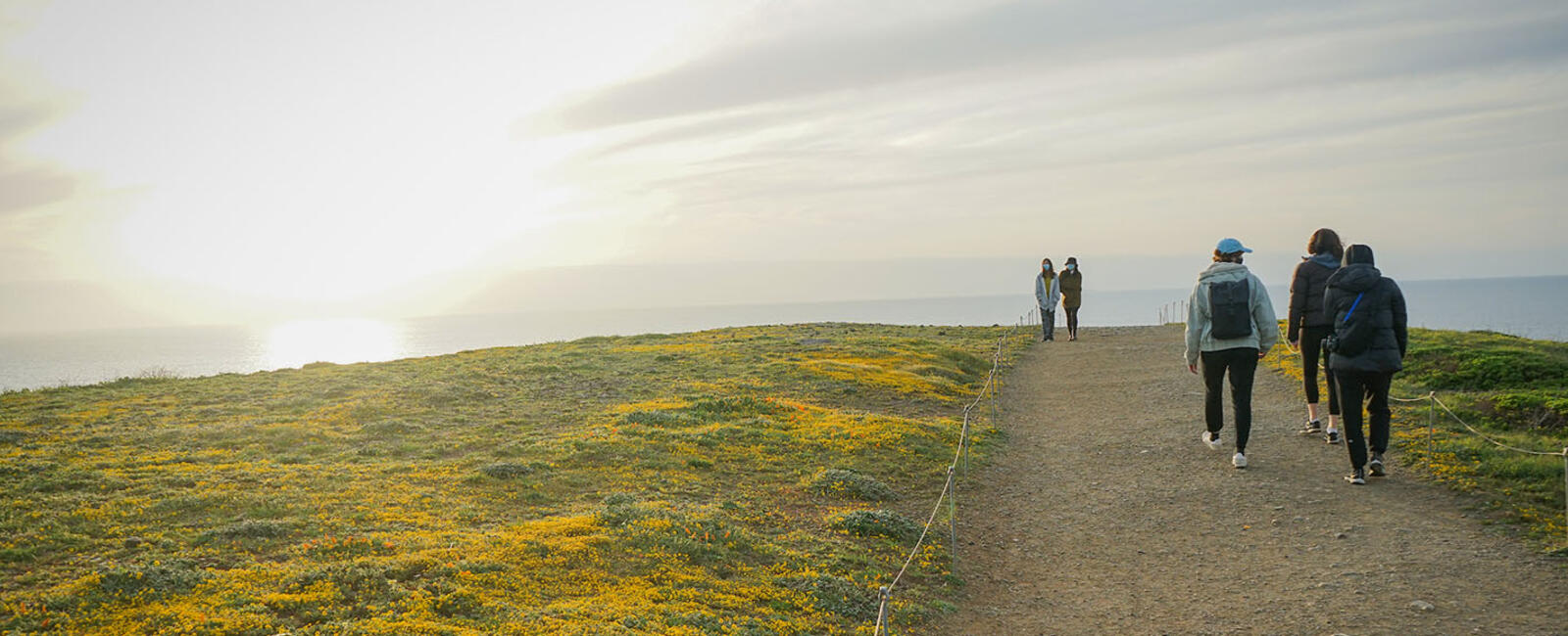 People hiking at Mori Point in San Mateo County.