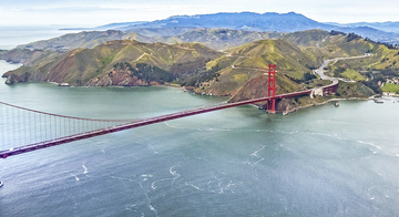 The Golden Gate Bridge, Marin Headlands and Mt. Tam seen in an aerial image.