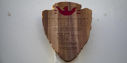 NPS arrowhead commemorating Alcatraz Occupation