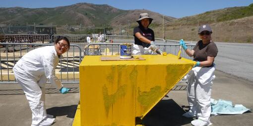 Volunteers re-painting structures at the Nike Missile Site in Marin.