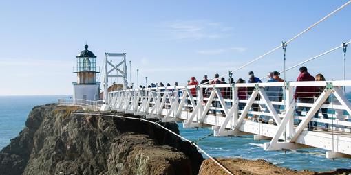 Visitors cross the bridge to Point Bonita Light