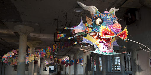 Colorful dragon suspended in an old Alcatraz prison building