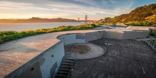 Image of a coastal battery with the Golden Gate Bridge in the distance