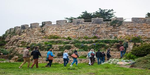 Group of hikers being guided by a Park Ranger