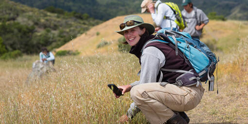 Bioblitz participants take photographs of organisms from trail.