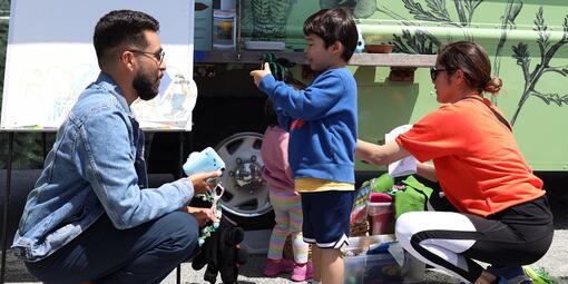 Child learning about nature with the Roving Ranger.