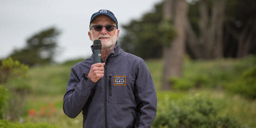 Greg Moore speaking at an event