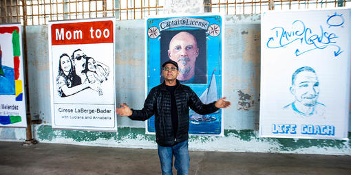 Artist Gregory Sale with some of the artwork at 'Future IDs at Alcatraz,' on display at the island through October.