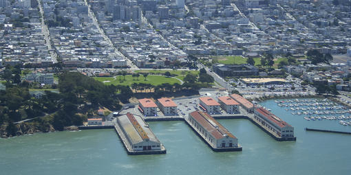Aerial photo of Fort Mason, the San Francisco Bay, and the city.
