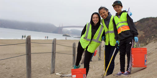 Volunteers participating in a beach cleanup