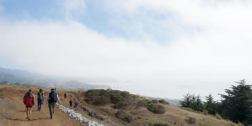 Youth hiking in Milagra Ridge