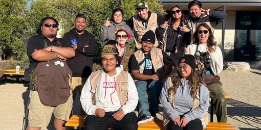 A group of Adventure Guides gather for a photo at the Presidio Tunnel Tops in the San Francisco Bay Area.