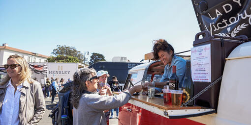 A vendor sells drinks at Presidio Tunnel Tops Opening Day.