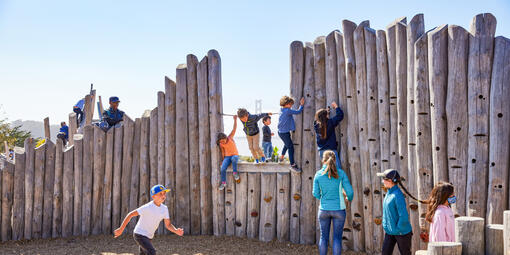 Kids at play on the climbing wall of The Outpost at Presidio Tunnel Tops.