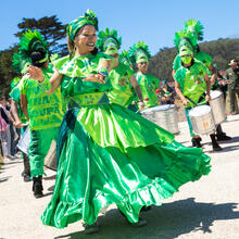 Fogo Na Roupa dancers and band parade throughout the Presidio Tunnel Tops.