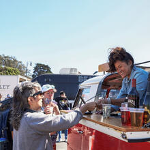 A vendor sells drinks at Presidio Tunnel Tops Opening Day.