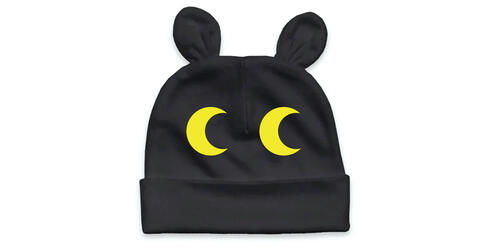 Black and yellow infant cap with animal eyes.